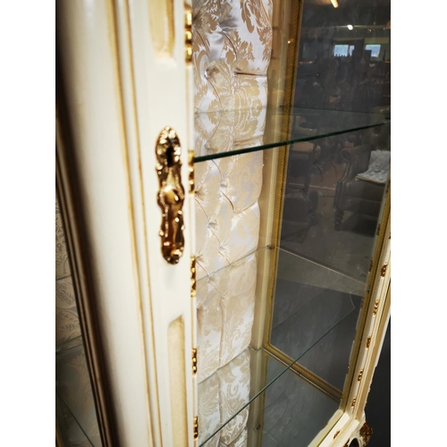 282 - Decorative painted and gilded wooden display cabinet on cabriole legs {202 cm H x 68 cm W x 42 cm D}... 