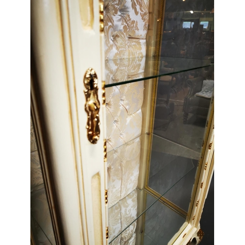 282 - Decorative painted and gilded wooden display cabinet on cabriole legs {202 cm H x 68 cm W x 42 cm D}... 