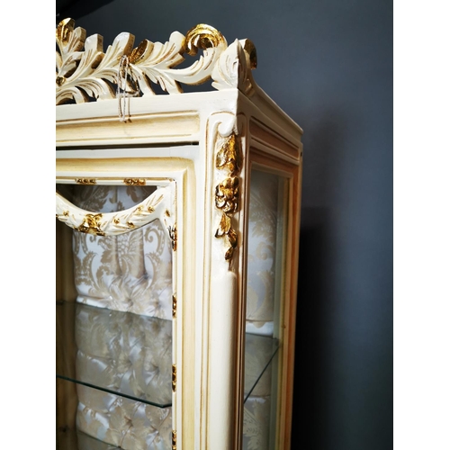 282 - Decorative painted and gilded wooden display cabinet on cabriole legs {202 cm H x 68 cm W x 42 cm D}... 