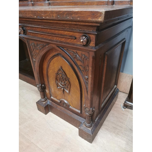 310A - Good quality Victorian carved oak side board in the Gothic style {150 cm H x 231 cm W x 73 cm D}.