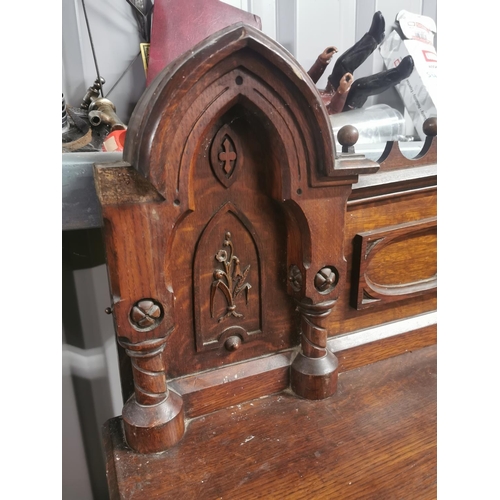 310A - Good quality Victorian carved oak side board in the Gothic style {150 cm H x 231 cm W x 73 cm D}.
