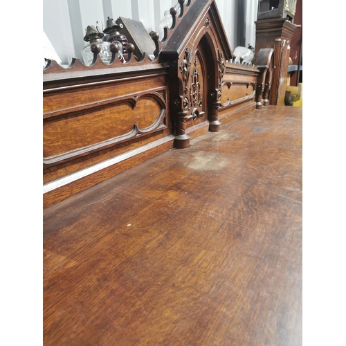 310A - Good quality Victorian carved oak side board in the Gothic style {150 cm H x 231 cm W x 73 cm D}.