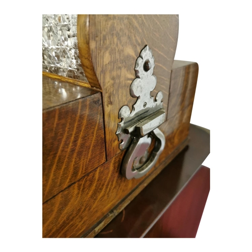 311 - Good quality 19th C. oak tantulus with three complete glass decanters {42 cm H x 33 cm W x 26 cm D}.