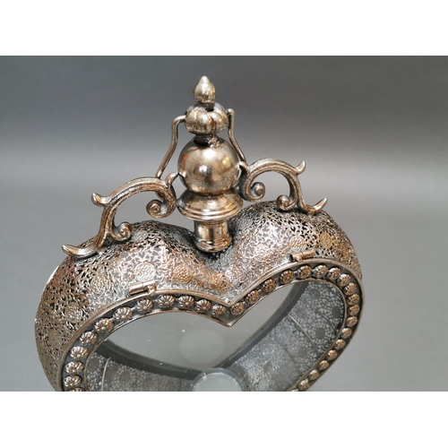 314 - Decorative silver plated candle holder in the form of a heart {52 cm H x 38 cm W x 11 cm D}.