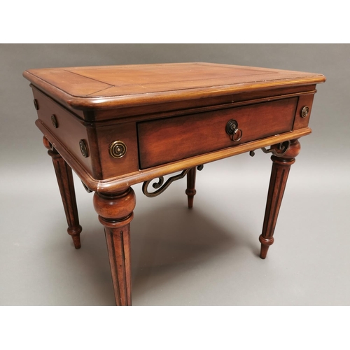 319 - Walnut lamp table with single drawer in the frieze on reeded legs {64 cm H x 66 cm W x 56 cm D}.