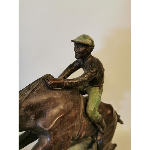 320 - Bronze model of a Horse and Jockey mounted on marble base {43 cm H x 37 cm W x 18 cm D}.