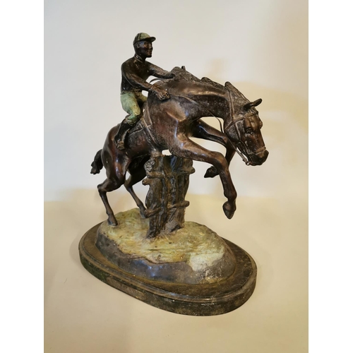 320 - Bronze model of a Horse and Jockey mounted on marble base {43 cm H x 37 cm W x 18 cm D}.