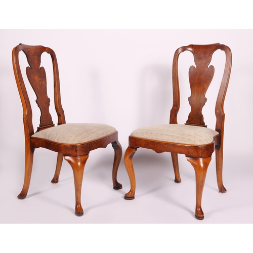 320A - Set of eight walnut and upholstered dining chairs on cabriole legs in the Queen Anne style {101 cm H... 