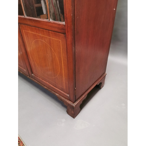 321 - Georgian inlaid mahogany book case with astral glazed doors {192 cm H x 121 cm W x 57 cm D}.