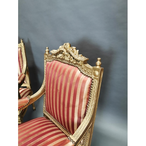 322 - Pair of carved giltwood and upholstered arm chairs in the French style {108 cm H x 56 cm W x 56 cm D... 