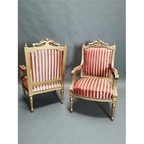 322 - Pair of carved giltwood and upholstered arm chairs in the French style {108 cm H x 56 cm W x 56 cm D... 