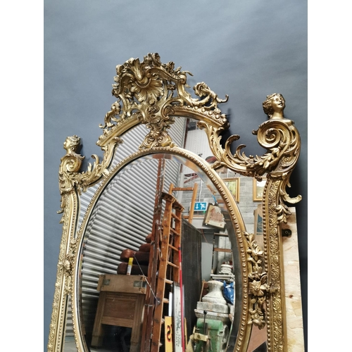 324 - 19th C. giltwood and gesso French wall mirror decorated with foliage {140 cm H x 96 cm W}.