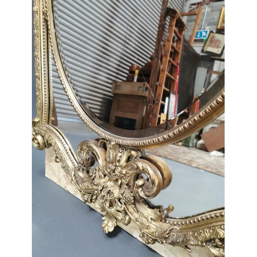 324 - 19th C. giltwood and gesso French wall mirror decorated with foliage {140 cm H x 96 cm W}.