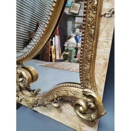 324 - 19th C. giltwood and gesso French wall mirror decorated with foliage {140 cm H x 96 cm W}.