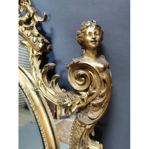 324 - 19th C. giltwood and gesso French wall mirror decorated with foliage {140 cm H x 96 cm W}.