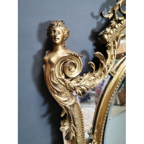 324 - 19th C. giltwood and gesso French wall mirror decorated with foliage {140 cm H x 96 cm W}.