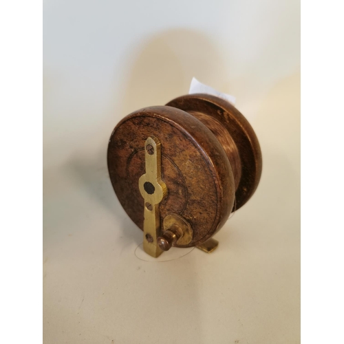 328 - Two early 20th C. mahogany and brass fishing reels.