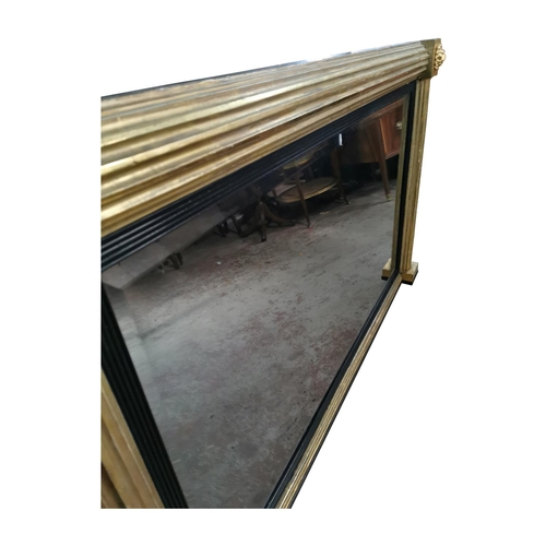 334 - Good quality Regency gilt mirror decorated with lions masks {87 cm H x 142 cm W}.