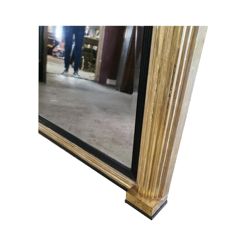 334 - Good quality Regency gilt mirror decorated with lions masks {87 cm H x 142 cm W}.