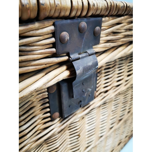 40 - Early 20th C. wicker laundry basket with metal mounts {63 cm H x 106 cm W x 55 cm D}.