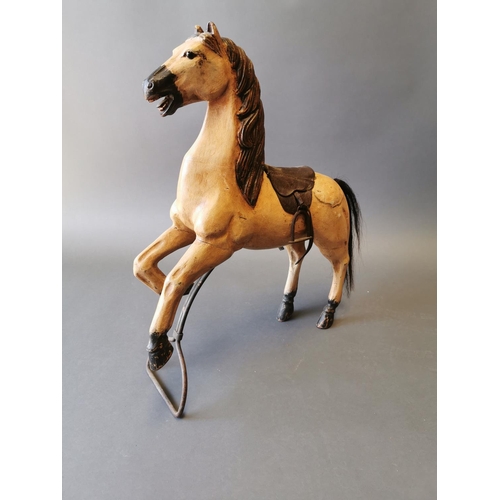 405 - Hand carved wooden child's horse {65 cm H x 56 cm W x 13 cm D}.