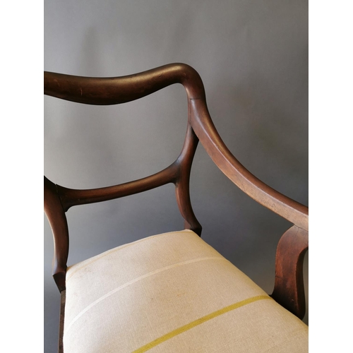 409 - Regency mahogany open arm chair on reeded legs {90 cm H x 54 cm W x 50 cm D}.