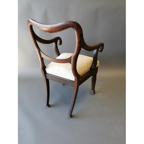 409 - Regency mahogany open arm chair on reeded legs {90 cm H x 54 cm W x 50 cm D}.