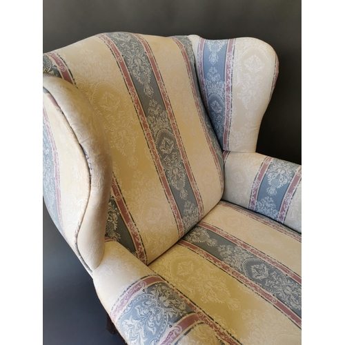 411 - Georgian mahogany and upholstered wing back arm chair on square legs {100 cm H x 79 cm W x 83 cm D}.