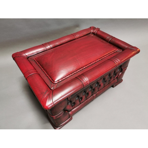 415 - Good quality oxblood leather deep buttoned Chesterfield ottoman with lift up lid {35 cm H x 75 cm W ... 