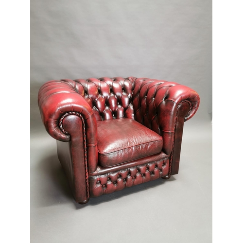 416 - Good quality oxblood leather deep buttoned Chesterfield club chair {77 cm H x 88 cm W x 86 cm D}.