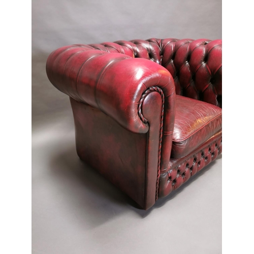 416 - Good quality oxblood leather deep buttoned Chesterfield club chair {77 cm H x 88 cm W x 86 cm D}.