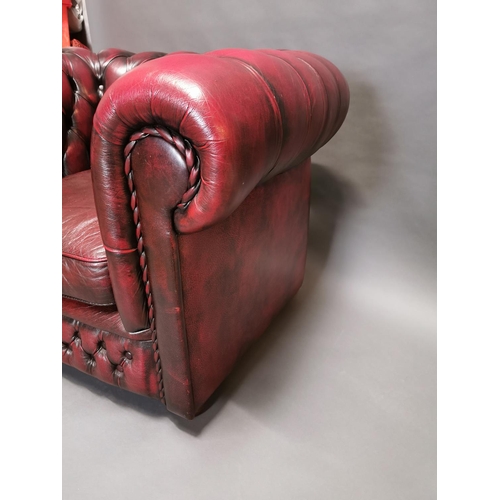 416 - Good quality oxblood leather deep buttoned Chesterfield club chair {77 cm H x 88 cm W x 86 cm D}.