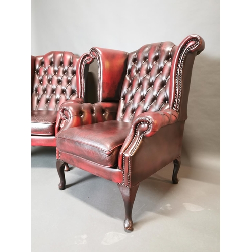 417 - Pair of good quality ox blood leather deep buttoned Chesterfield wing back arm chairs {113 cm H x 90... 