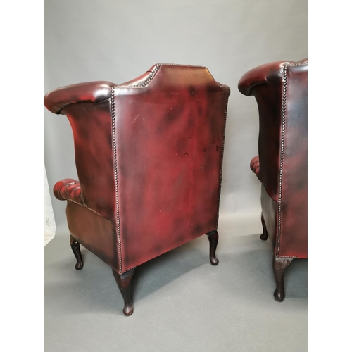 417 - Pair of good quality ox blood leather deep buttoned Chesterfield wing back arm chairs {113 cm H x 90... 