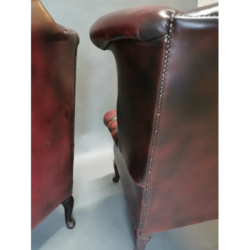 417 - Pair of good quality ox blood leather deep buttoned Chesterfield wing back arm chairs {113 cm H x 90... 