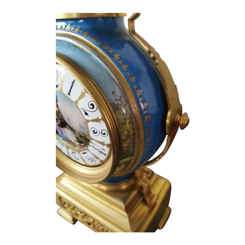 421 - 19th C. gilded brass and enamel mantle clock {40 cm H x 11 cm W x 17 cm D}.