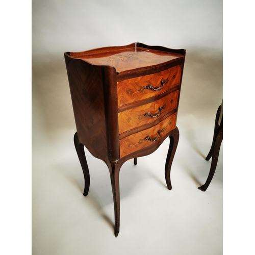 423 - Pair of kingwood bedside lockers with three drawers on cabriole legs {71 cm H x 36 cm W x 30 cm D}.