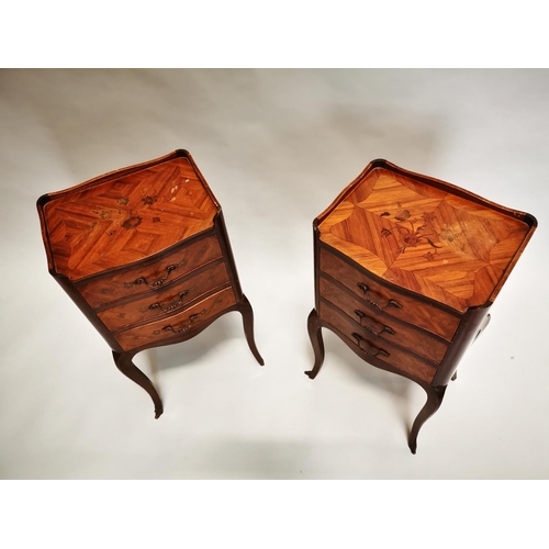 423 - Pair of kingwood bedside lockers with three drawers on cabriole legs {71 cm H x 36 cm W x 30 cm D}.