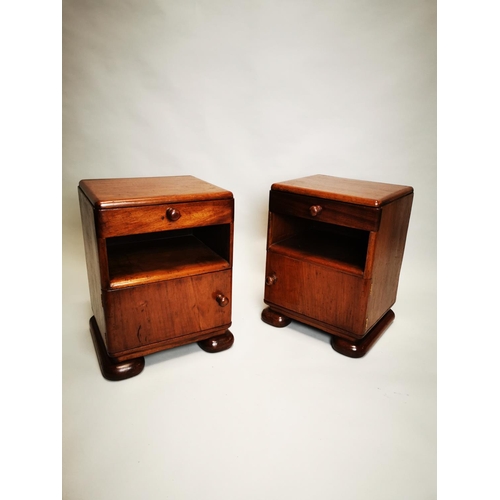 425 - Pair of Art Deco mahogany bedside lockers {55 cm H x 42 cm W x 38 cm D}.