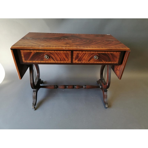 428 - Mahogany inlaid sofa table with two drawers in the frieze on lyre supports in the Georgian style {73... 