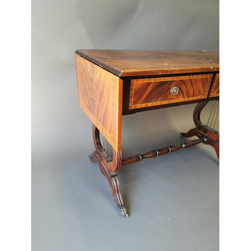 428 - Mahogany inlaid sofa table with two drawers in the frieze on lyre supports in the Georgian style {73... 