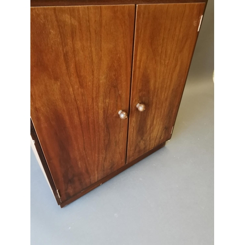 430 - Retro teak side cabinet with sliding glass doors and two blind doors {142 cm H x 68 cm W x 30 cm D}.