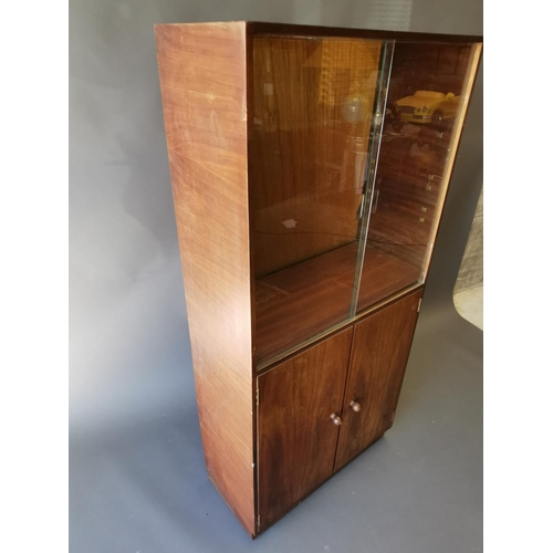 430 - Retro teak side cabinet with sliding glass doors and two blind doors {142 cm H x 68 cm W x 30 cm D}.