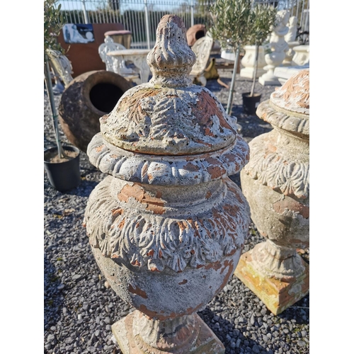 460 - Pair of glazed terracotta lidded urns in the Adam's style {82 cm H x 35 cm Dia.}.