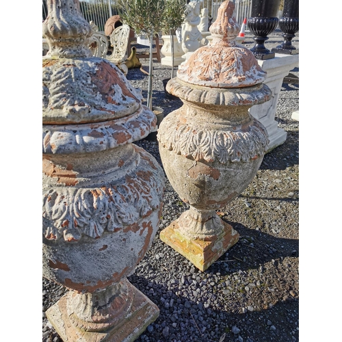 460 - Pair of glazed terracotta lidded urns in the Adam's style {82 cm H x 35 cm Dia.}.