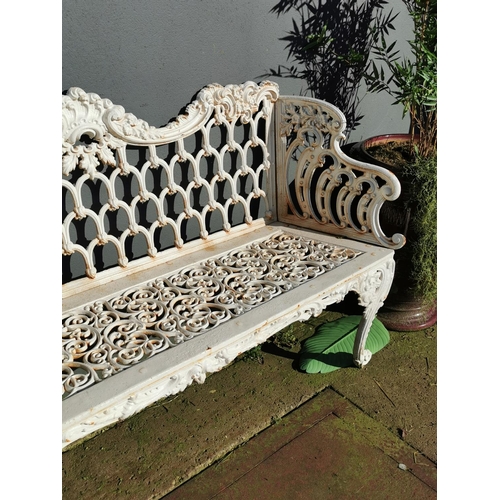 470 - Decorative cast iron three seater garden bench {91 cm H x 148 cm W x 52 cm D}.