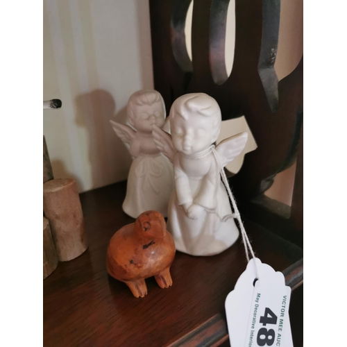 485 - Shelf 3: Collection of carved birds and two ceramic Angels