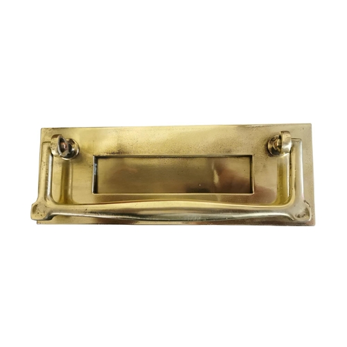 490A - Edwardian brass letter box {8 cm H x 22 cm W}.
