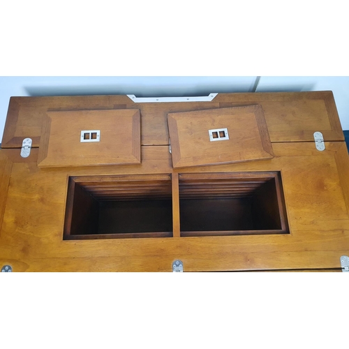 493 - Nautical themed coffee table in the Art Deco style with two fold out leaves and internal drinks comp... 
