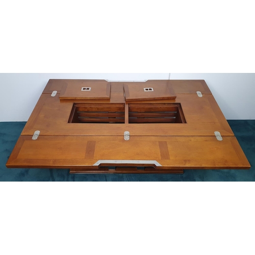 493 - Nautical themed coffee table in the Art Deco style with two fold out leaves and internal drinks comp... 